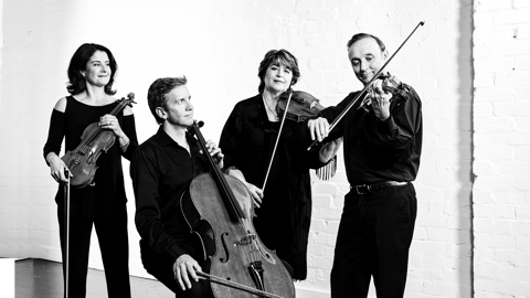 Goldner String Quartet playing instruments