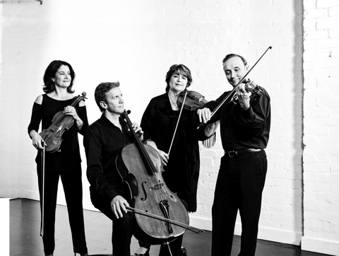 Goldner String Quartet playing instruments